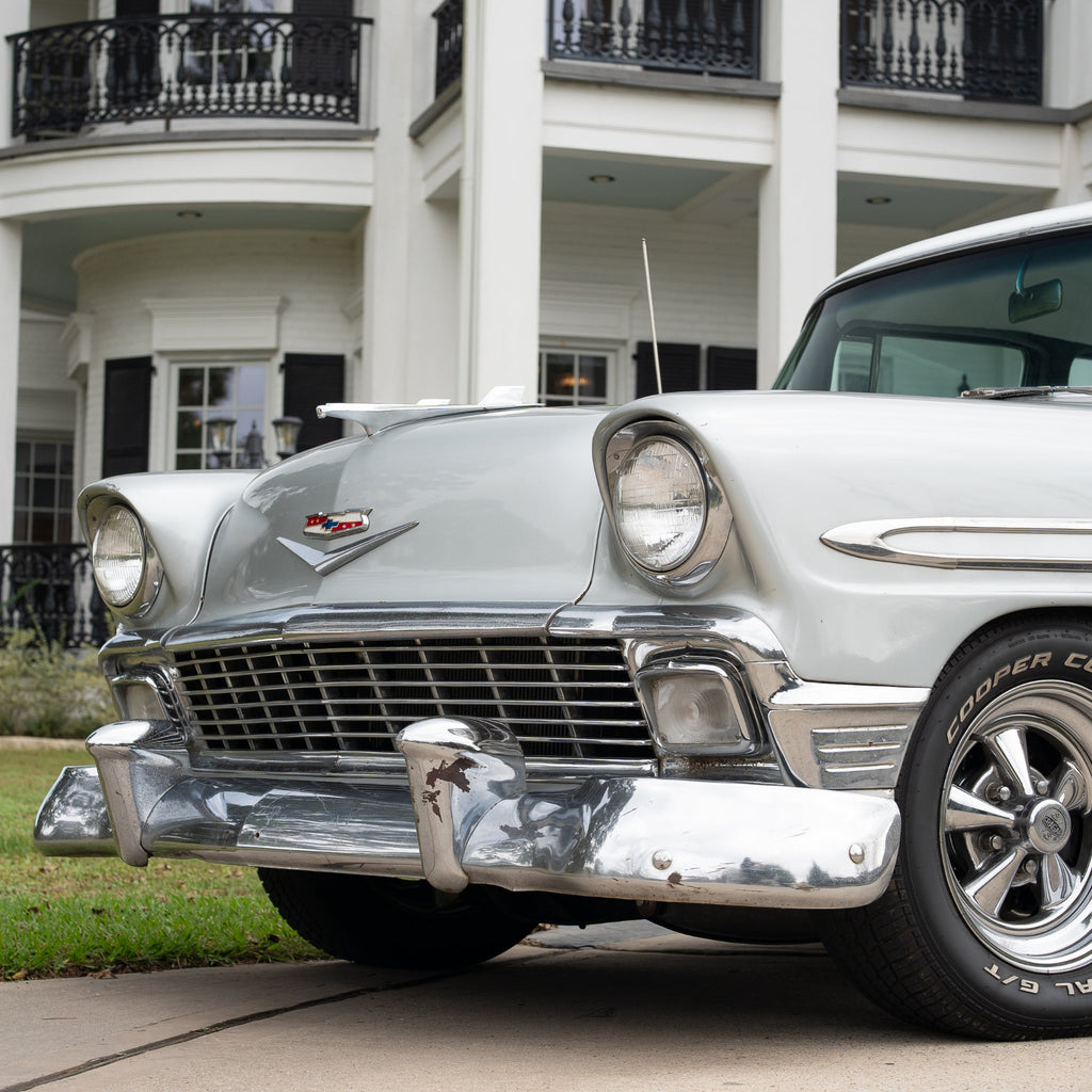 Selah, a grey and white 1956 Chevrolet Bel Air, outside Sandlewood Manor